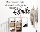 "You're Never Fully Dressed Until You Wear A Smile" Inspiring Wall Quote